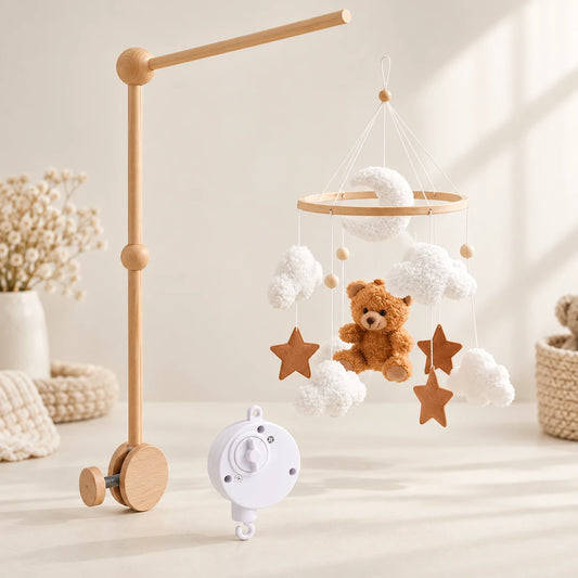 Pack Ourson des Nuages : mobile ours brun, support en bois et boîte musicale blanche présentés séparément.