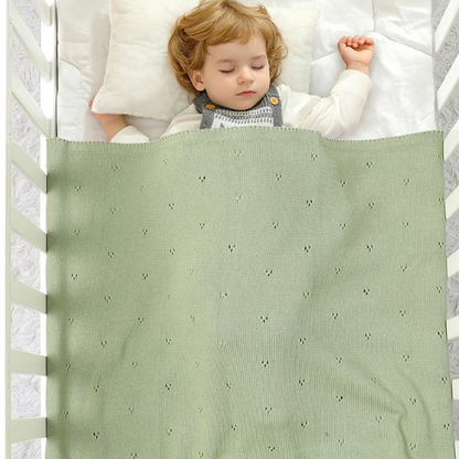 couverture-bebe-tricot-bébé-qui-dors-paisiblement