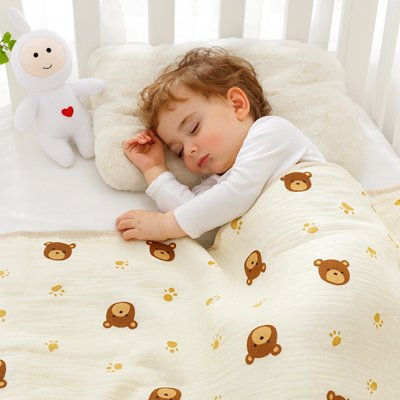 Bébé qui fait une sieste sous sa Couverture bébé ourson