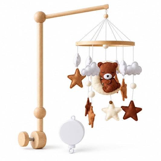 Pack Escale sur la Lune sur fond blanc : mobile ours brun sur une lune écrue, support en bois et boîte musicale blanche.