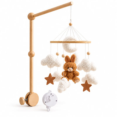 Pack Les Nuages de Lapinou sur fond blanc : mobile lapin brun, support en bois et boîte musicale blanche.