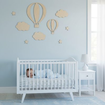 Stickers muraux dans chambre bébé ou il dort paisiblement
