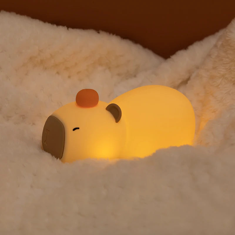 veilleuse bébé en forme de capybara lumiere apaisante