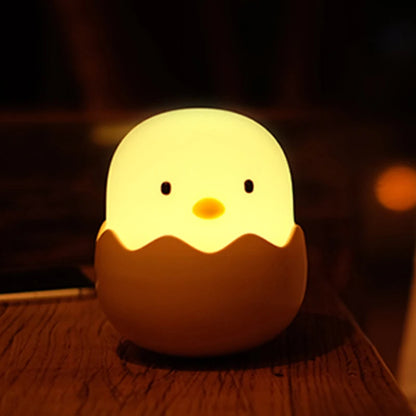 veilleuse bébé en forme de poussin dans une coquille d'oeuf 