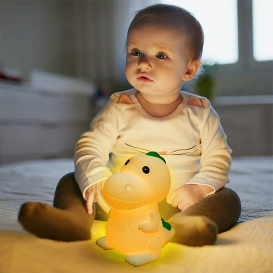 veilleuse pour bebe en forme de dinaisaure de couleur jaune